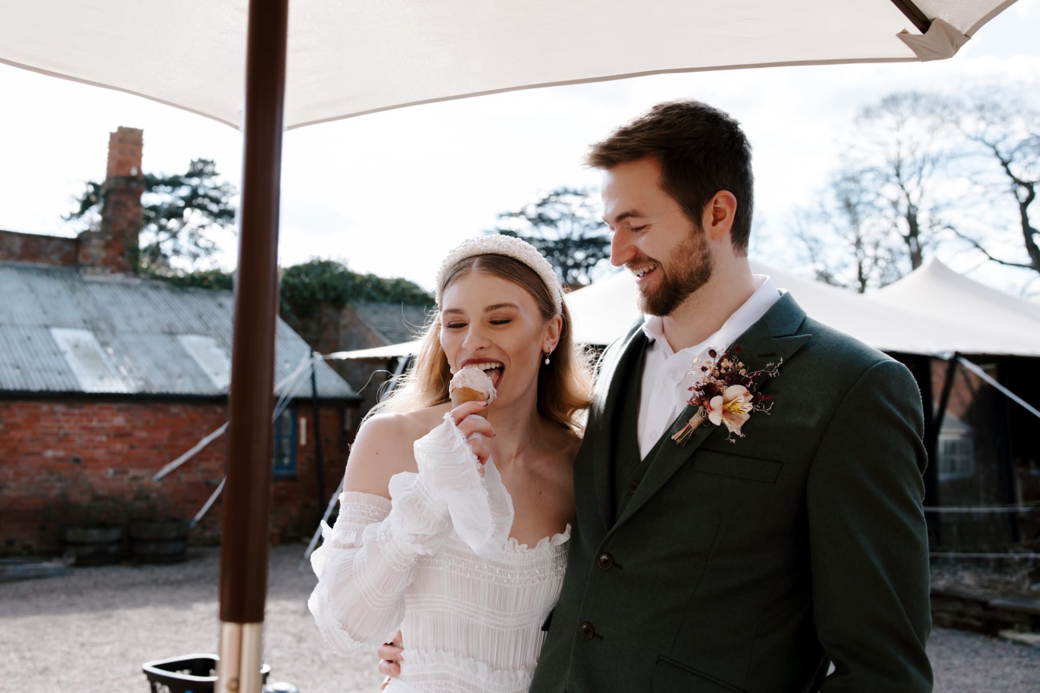 Couple laughing over a scoop